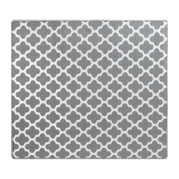 A rectangular dish drying mat with a geometric pattern consisting of connected quadrilateral shapes, primarily in a gray color with white accents.