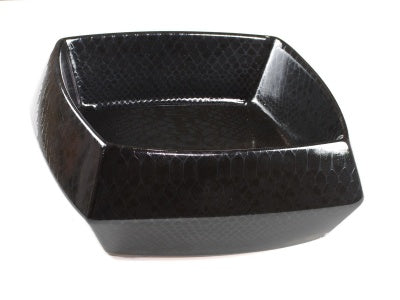 A black ceramic wash basin with a geometric design.