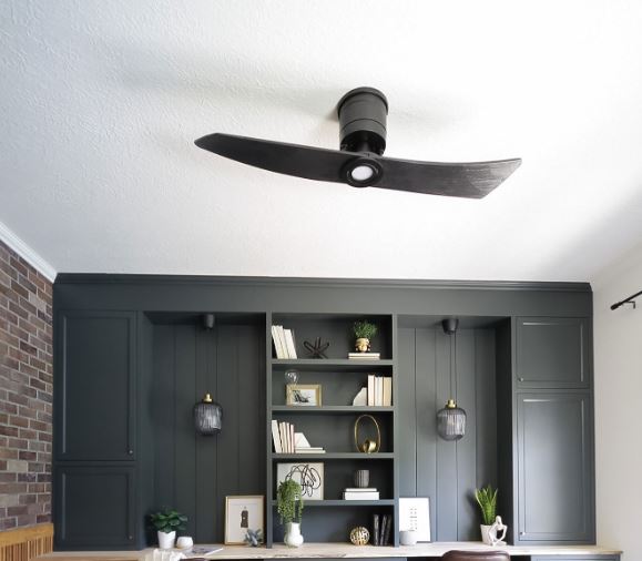 A matte black two-blade ceiling fan with integrated LED light, from the brand Lindsay.