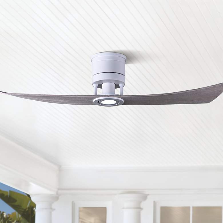 A matte white two-blade ceiling fan with integrated LED light, from the brand Lindsay.