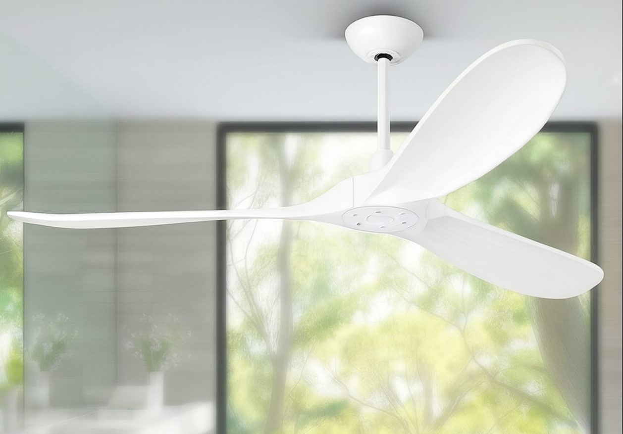 An installed view of a modern best ceiling fan with white blades and a minimalist design in a room.