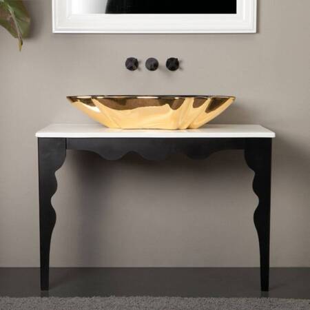 Close-up of SHELL designer washbasin – modern luxury sink with bold black and gold finish