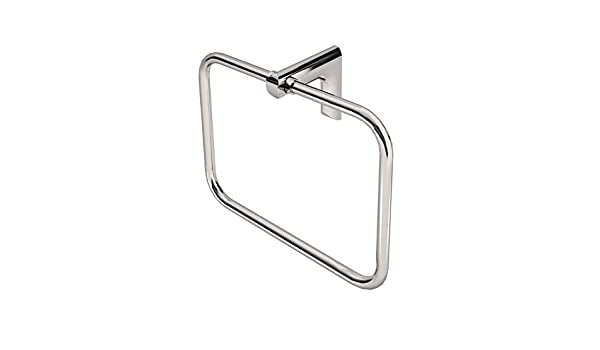 A silver towel ring with a simple, modern design attached to a white wall.