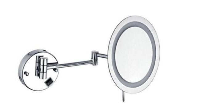 Wall mounted magnifying cosmetic mirror with a circular LED lighted edge.