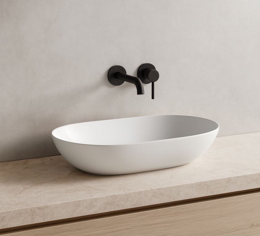 modern wash basin oval white installed on bathroom vanity