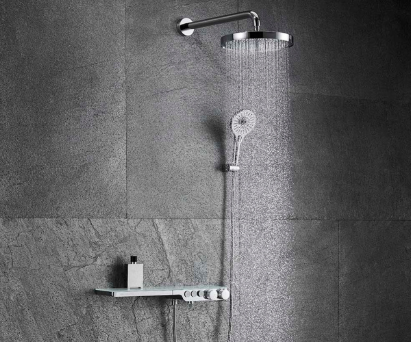 OMSA HB7655X exposed shower system installed on a bathroom wall with rain head and handheld shower