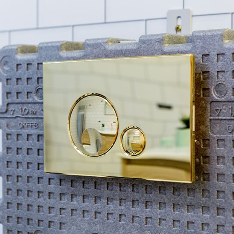 OLI Globe ABS flush plate installed on concealed toilet wall Pakistan — Sardar & Co Rawalpindi