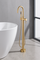 OMSA YD8804 floor-standing bathtub faucet Brushed Champagne Gold installed beside freestanding bathtub — luxury bathroom Pakistan, Sardar & Co Rawalpindi