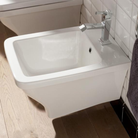 Scarabeo Butterfly wall mount bidet installed in premium bathroom Pakistan — Butterfly suite, Sardar & Co