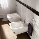 Scarabeo Butterfly wall mount bidet installed beside Butterfly WC Pakistan — complete suite, Sardar & Co Rawalpindi