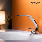 Valvex ASSO basin mixer installed on washbasin — compact luxury bathroom fitting, Sardar & Co Rawalpindi