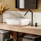 Valvex AVOLA 2-hole basin mixer installed on washbasin — luxury bathroom fitting, Sardar & Co Rawalpindi