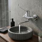 Valvex elbow-operated short-spout wall tap installed on basin — hospital and institutional grade fitting, Sardar & Co Rawalpindi